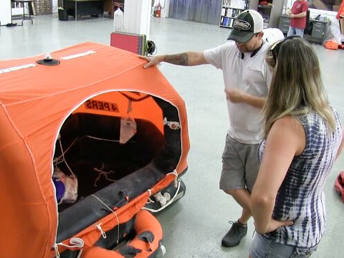 34. Life Raft Service & Doggie News